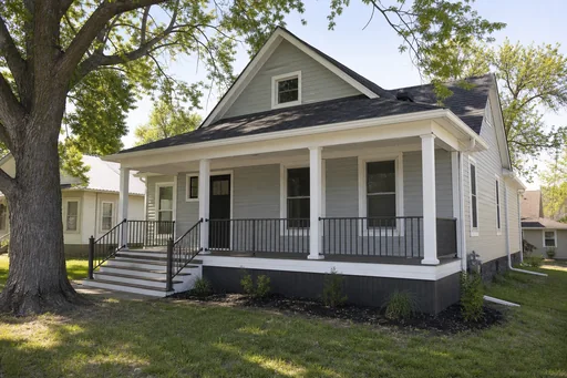 Representative porch, trim, and exterior repair work on an older Kansas home