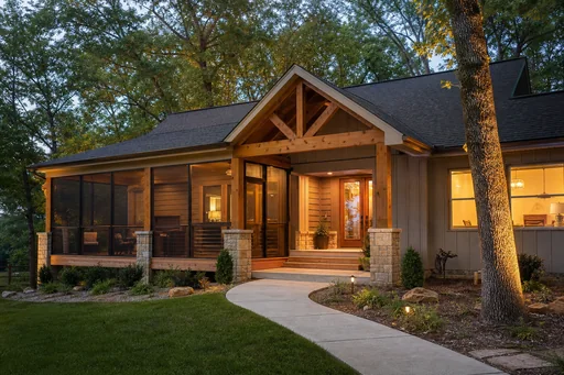 Representative deck resurfacing and railing update for a lake-area home