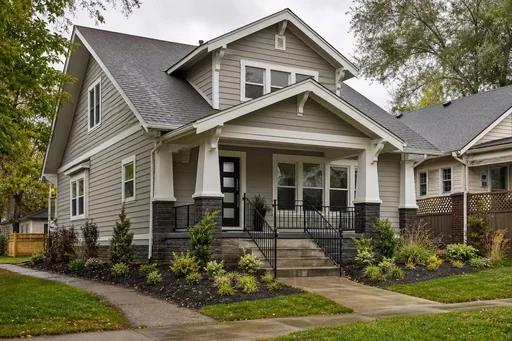 Representative exterior remodeling with siding, windows, trim, and porch detail